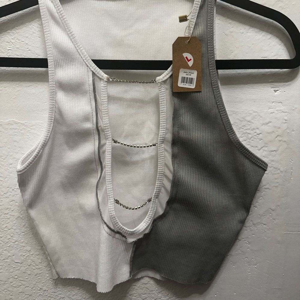 Size large stretchy top. Dress it up with jeans or wear over a swim suit